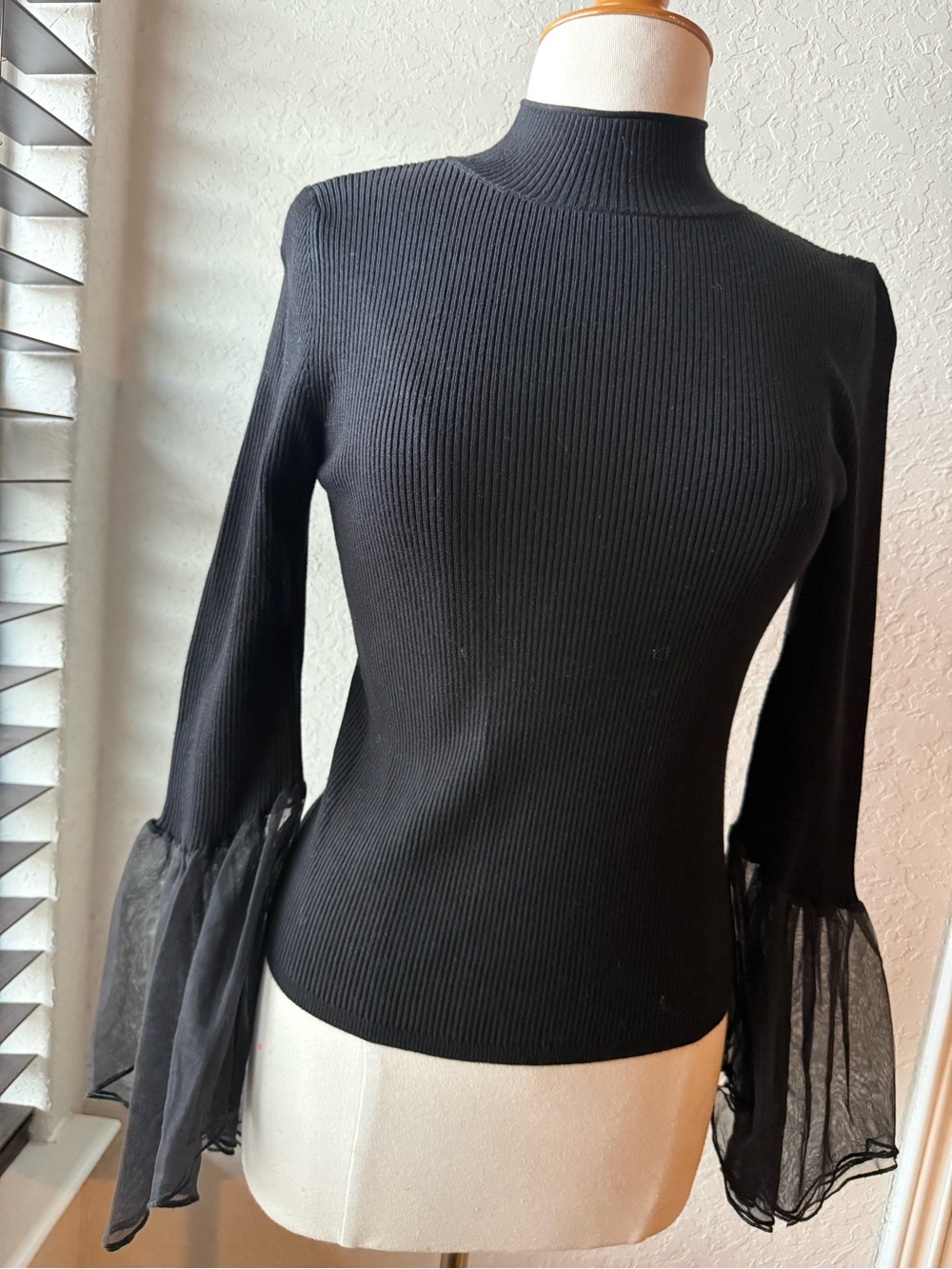 Anthropologie Black Ribbed Mock Neck Top with Sheer Bell Sleeves